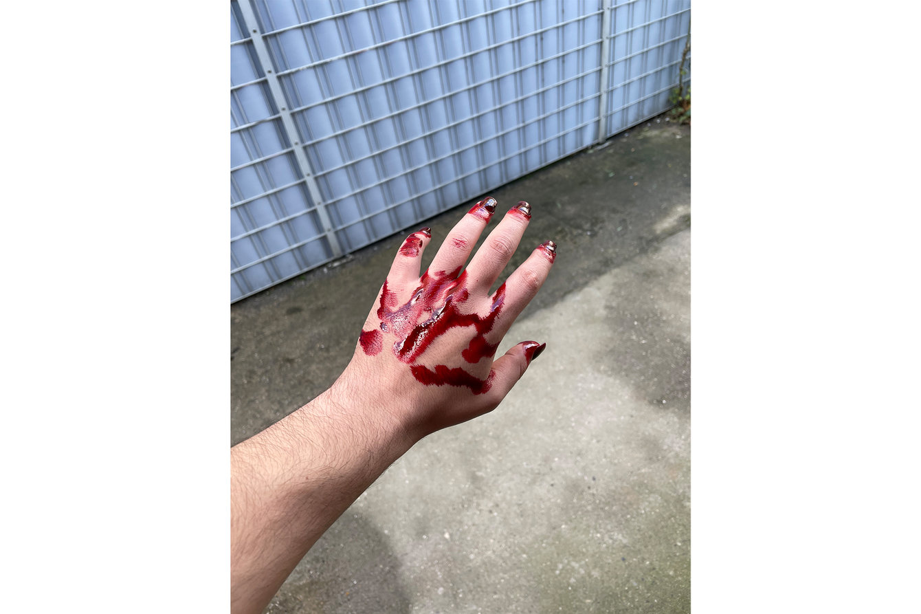 a hand full of fake blood